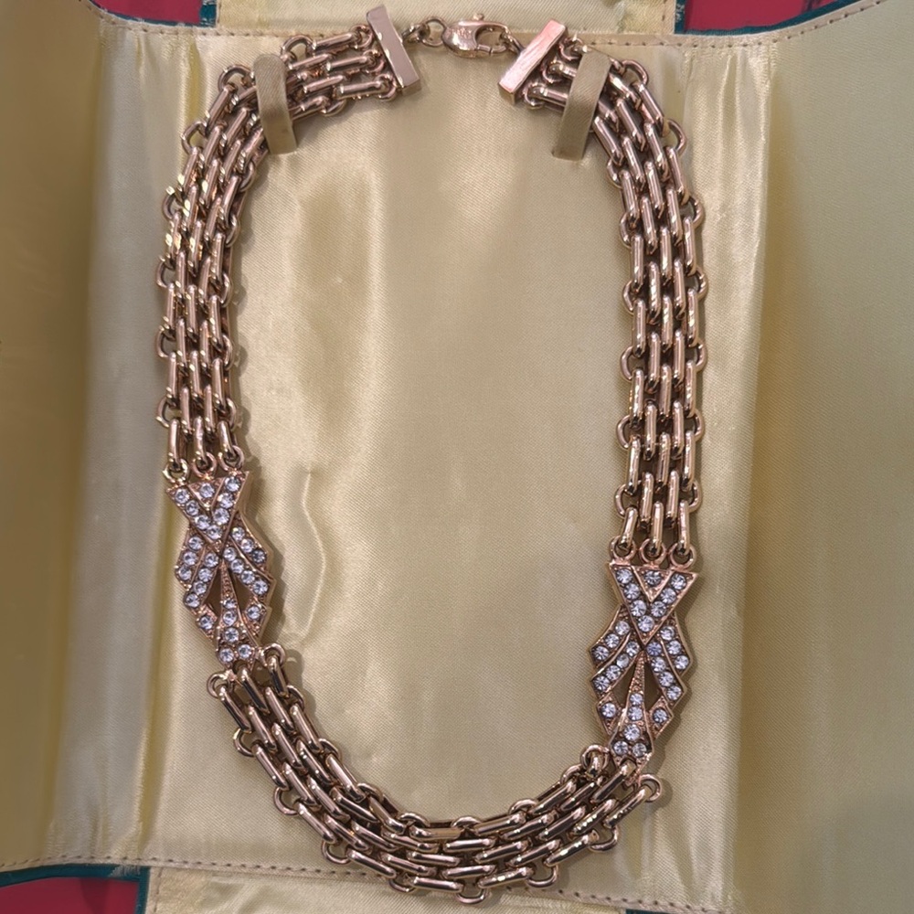 Gold Layered Necklace with Ornate Floral Design and Unique Chain Pattern